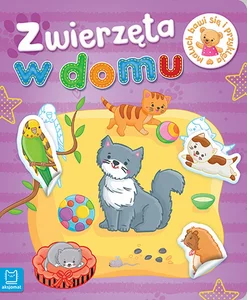 Maluch bawi się i przykleja Zwierzęta w domu