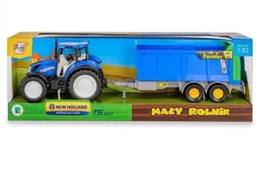 Traktor New Holland T5 z rozrzutnikiem obornika