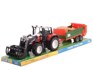 Traktor z łyżka i rozrzutnikiem